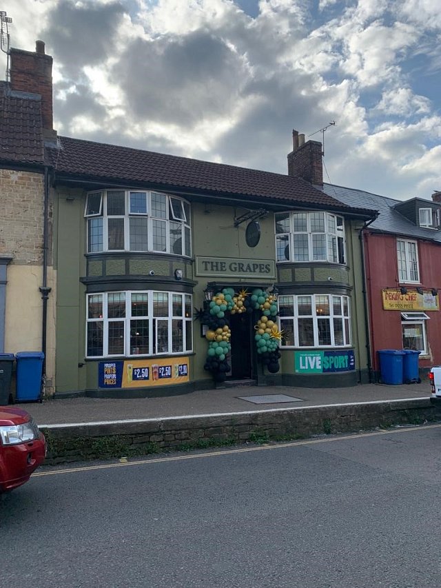 Street view of a pub facade