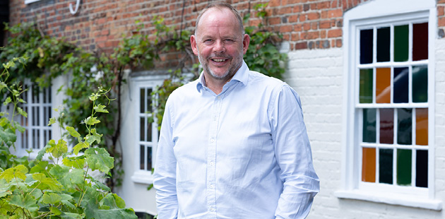 Man in white shirt managing director of pub company